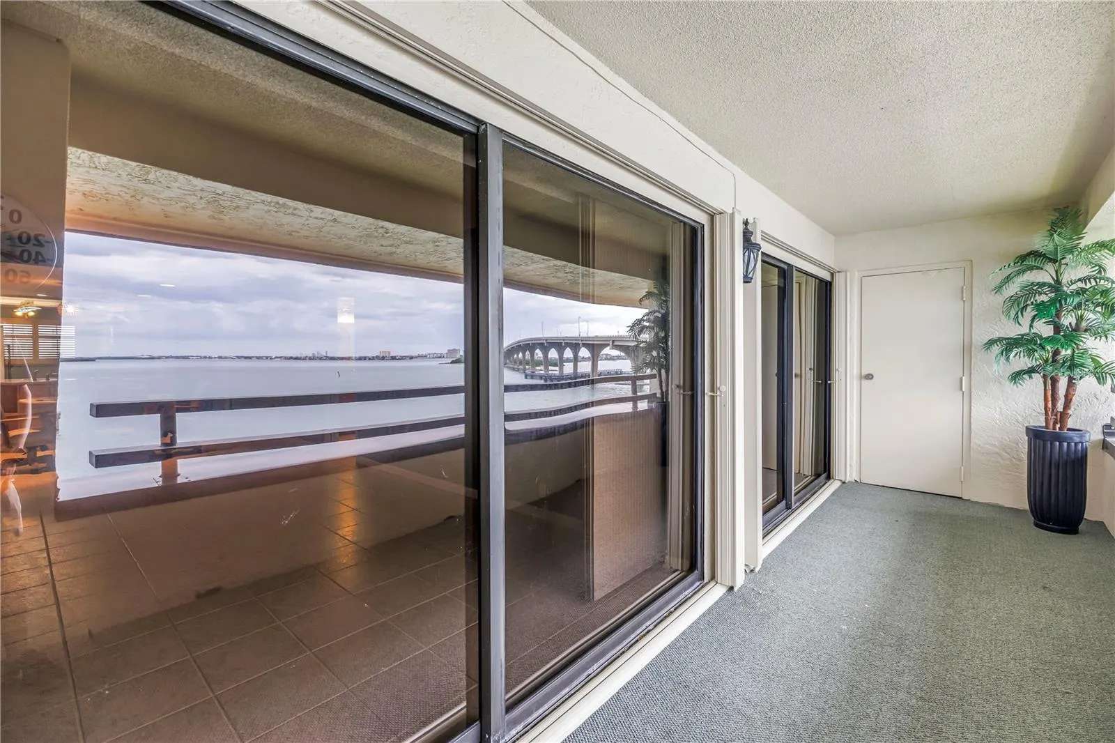 Balcony opens to LR and Primary Bedrrom