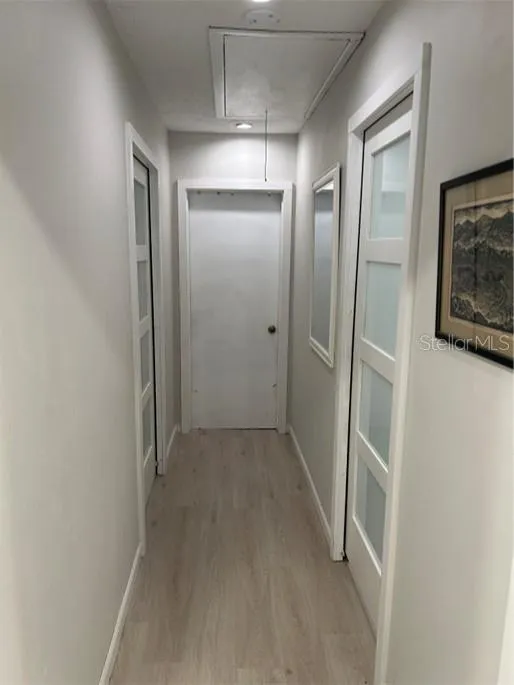 hall to laundry and bedroom attic access