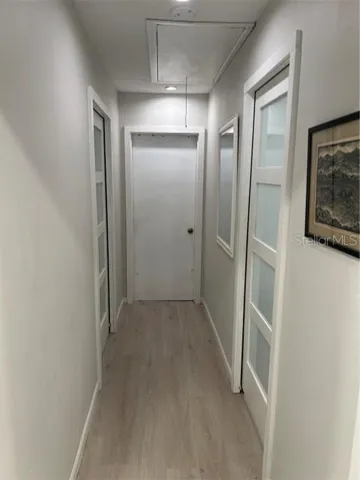 hall to laundry and bedroom attic access