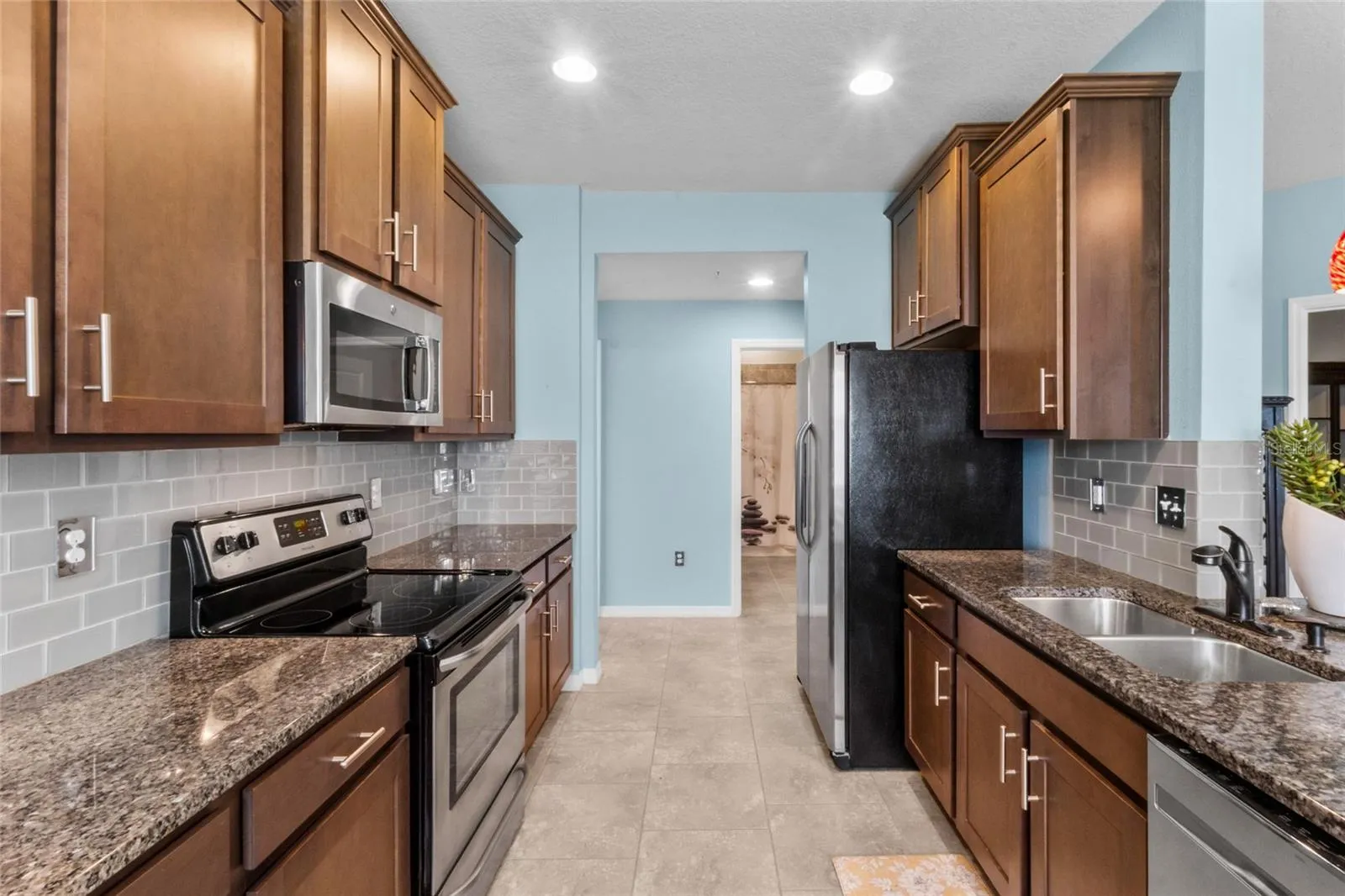 Kitchen with Stainless Steel and Granite Countertops