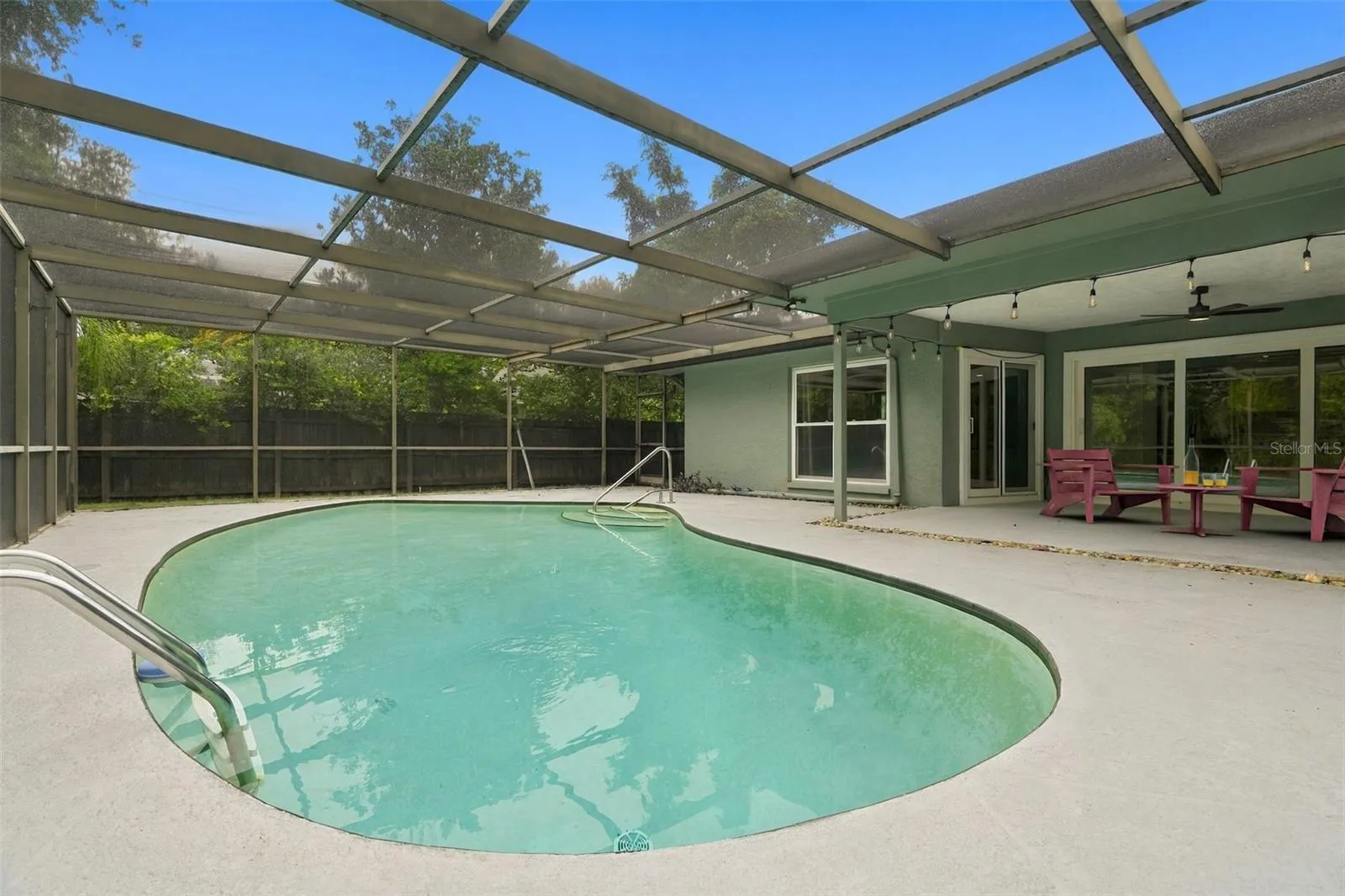 Screened enclosed pool area.