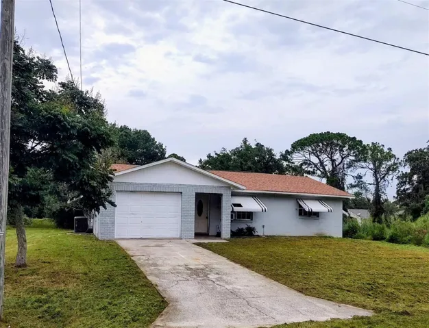 Front of Structure - 1 car garage and long driveway.