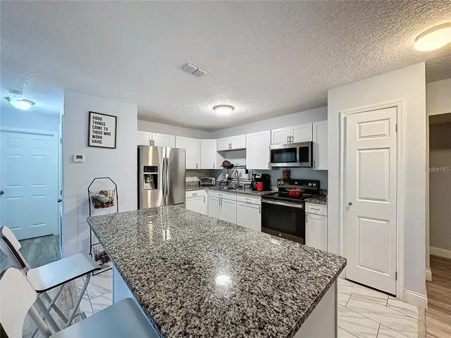 KITCHEN ANGLE FROM GRANITE  ISLAND