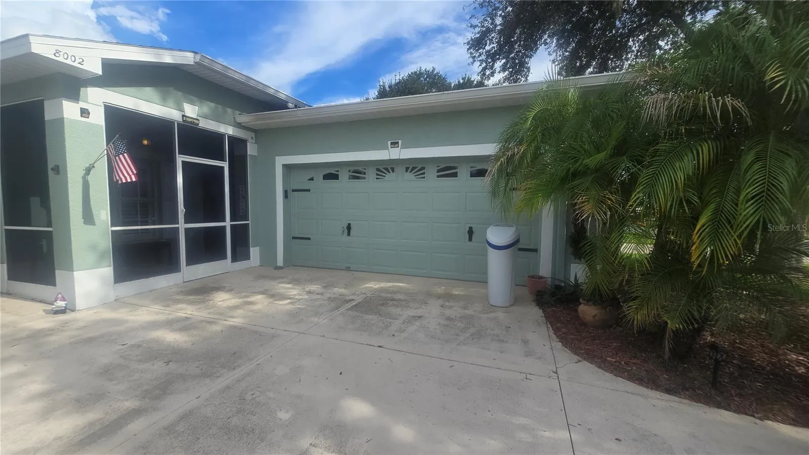 Side entry garage and front screened-in porch