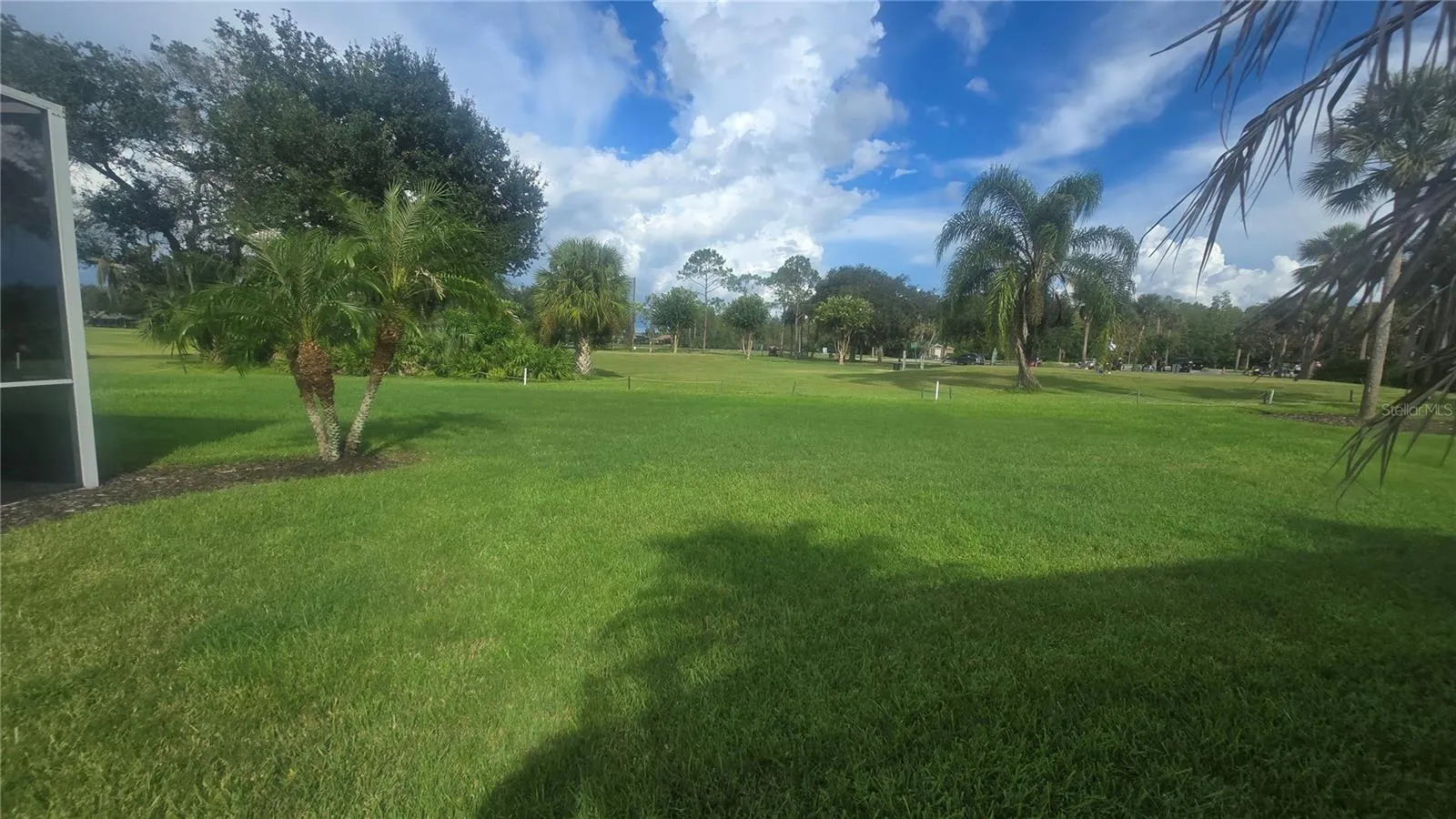 Golf course behind house