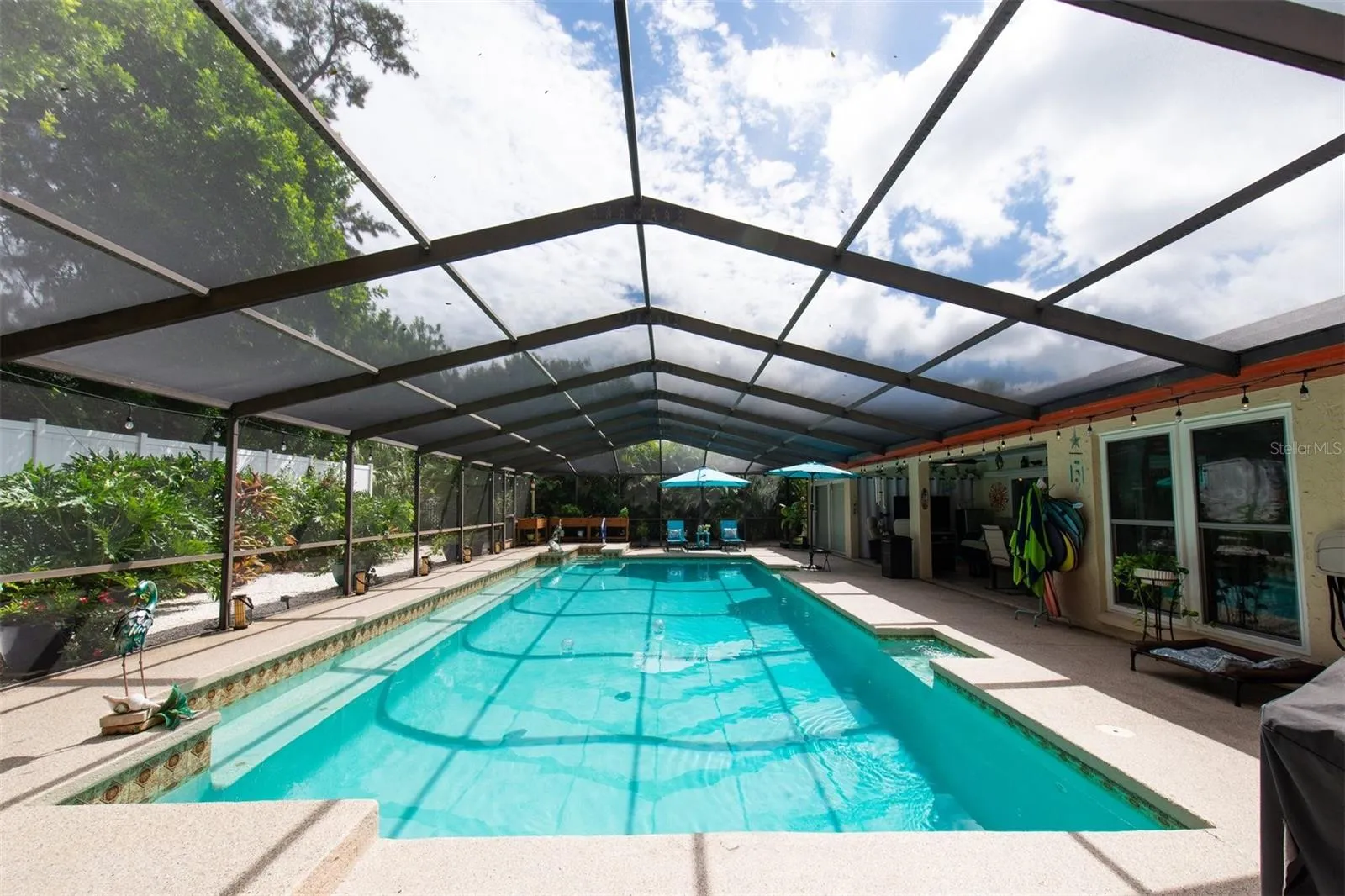 40x18 LAP POOL... WITH OUTDOOR LIVING AT IT'S FINEST!