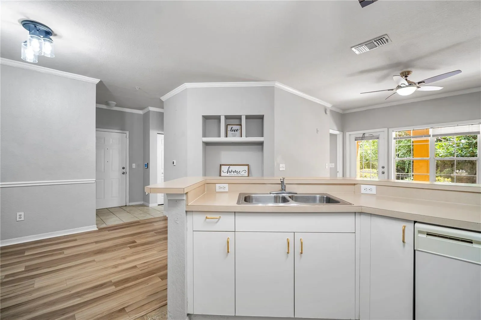 From Kitchen to LR, DR, Front Door