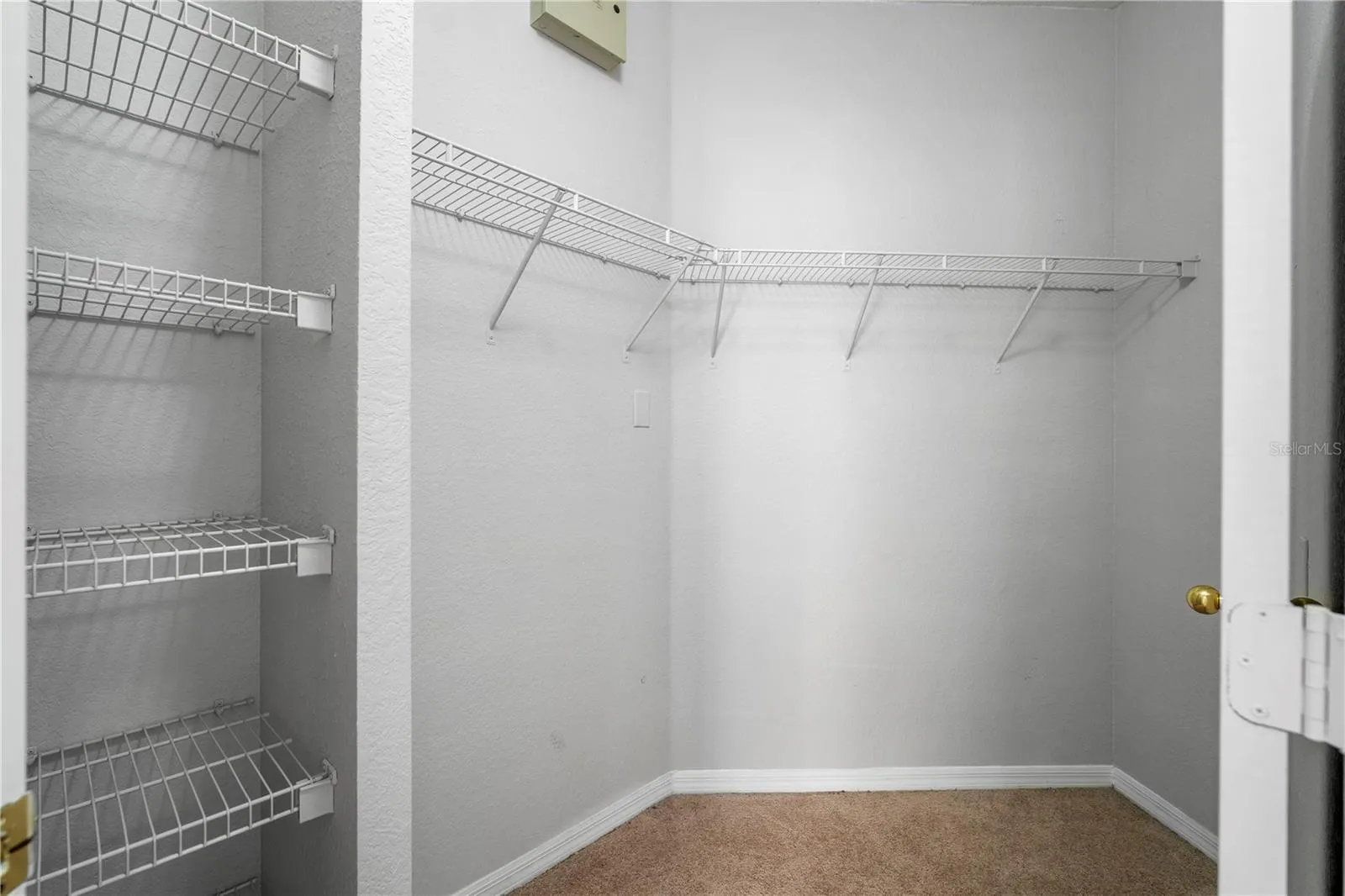 Walk-In Closet with Built-in Shelves