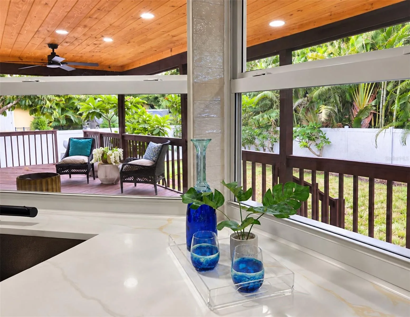 Kitchen pass-through window makes outdoor dining and entertaining effortless.