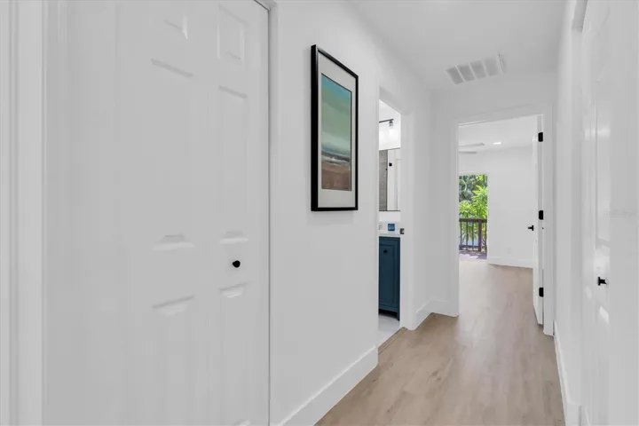 Split-bedroom design places two additional bedrooms on the opposite side of the home.