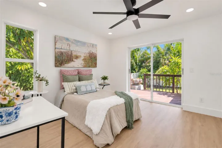 Bedroom 3 with tropical backyard views