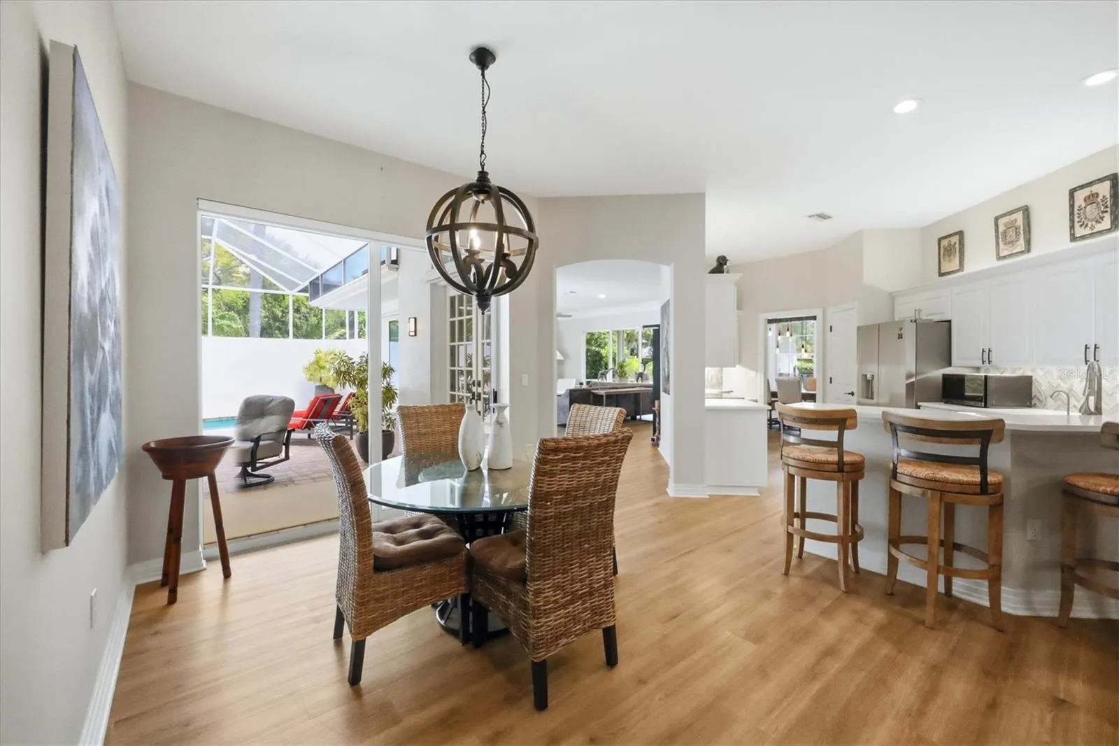 The Open Concept carries throughout the home- from the Kitchen to the Breakfast Nook, Family Room and Courtyard.