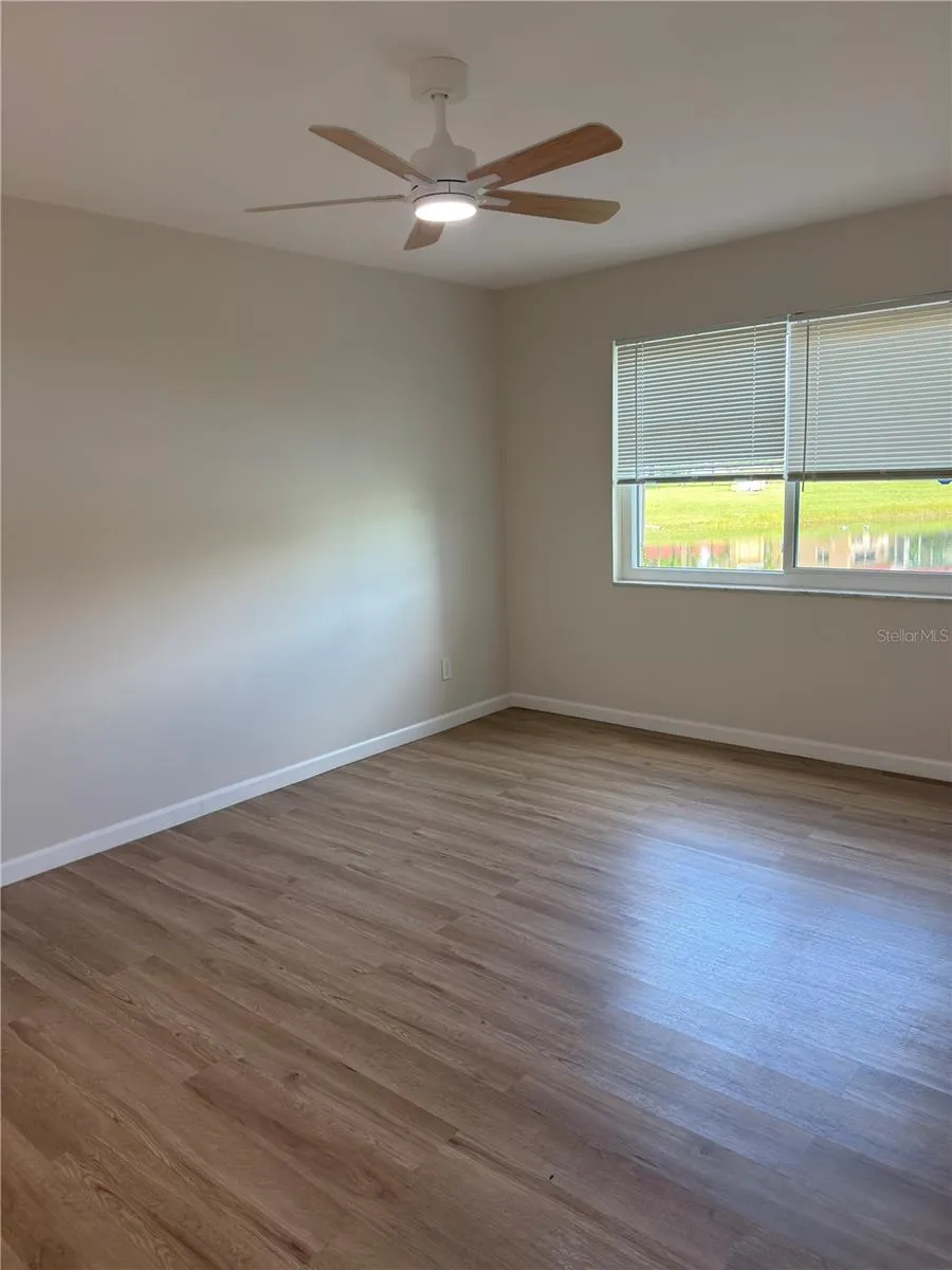 Guest bedroom or office with a water view