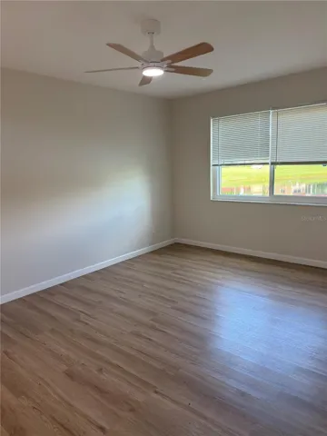 Guest bedroom or office with a water view