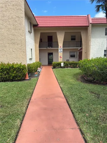 First floor center unit. Assigned parking space just in front of the walkway to front door.