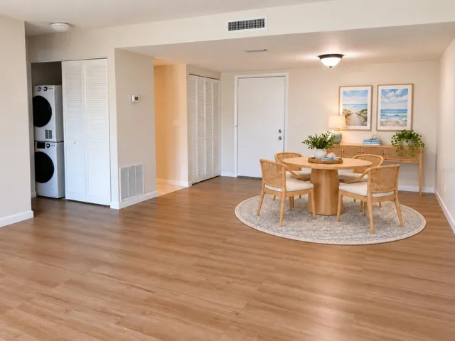 Open floor plan dining area.  Virturally staged