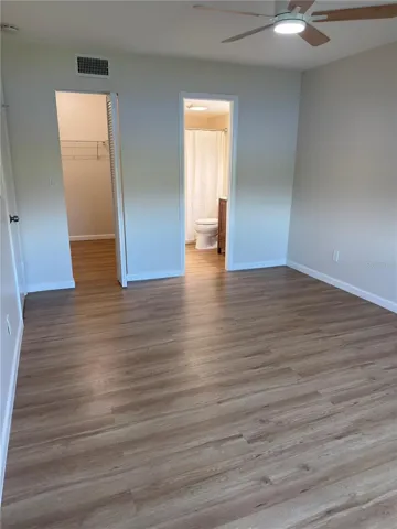 Primary bedroom ensuite bathroom and large walk in closet