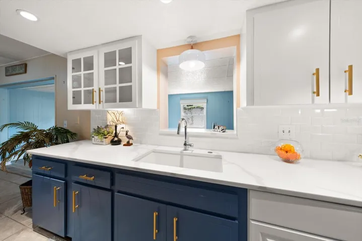 Kitchen with lots of overhead lighting