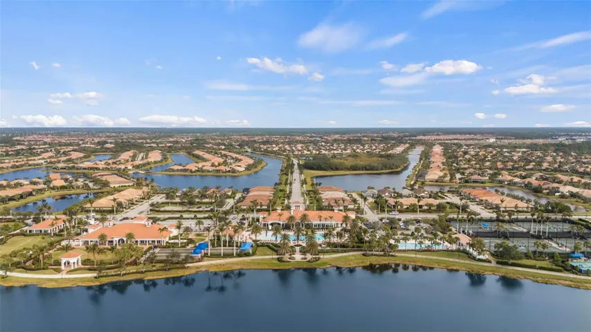 Rear view of event and resort centers as well as lap pool and racquet courts