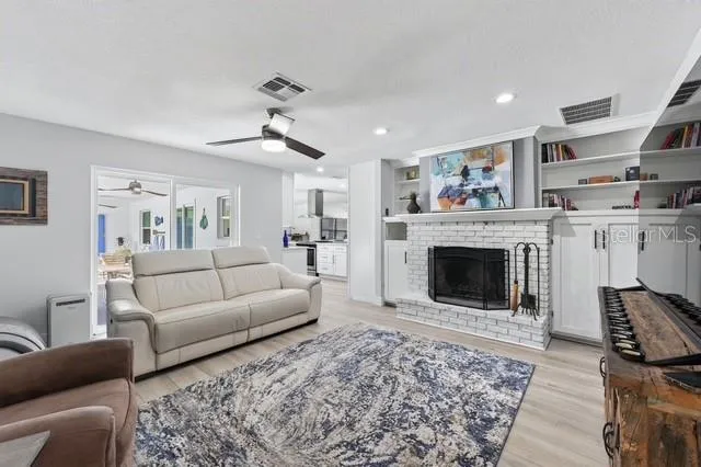 Family room looking towards kitchen and back porch