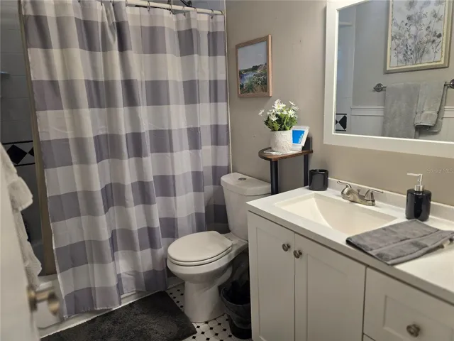 BATHROOM COMPLETE WITH TUB AND SHOWER