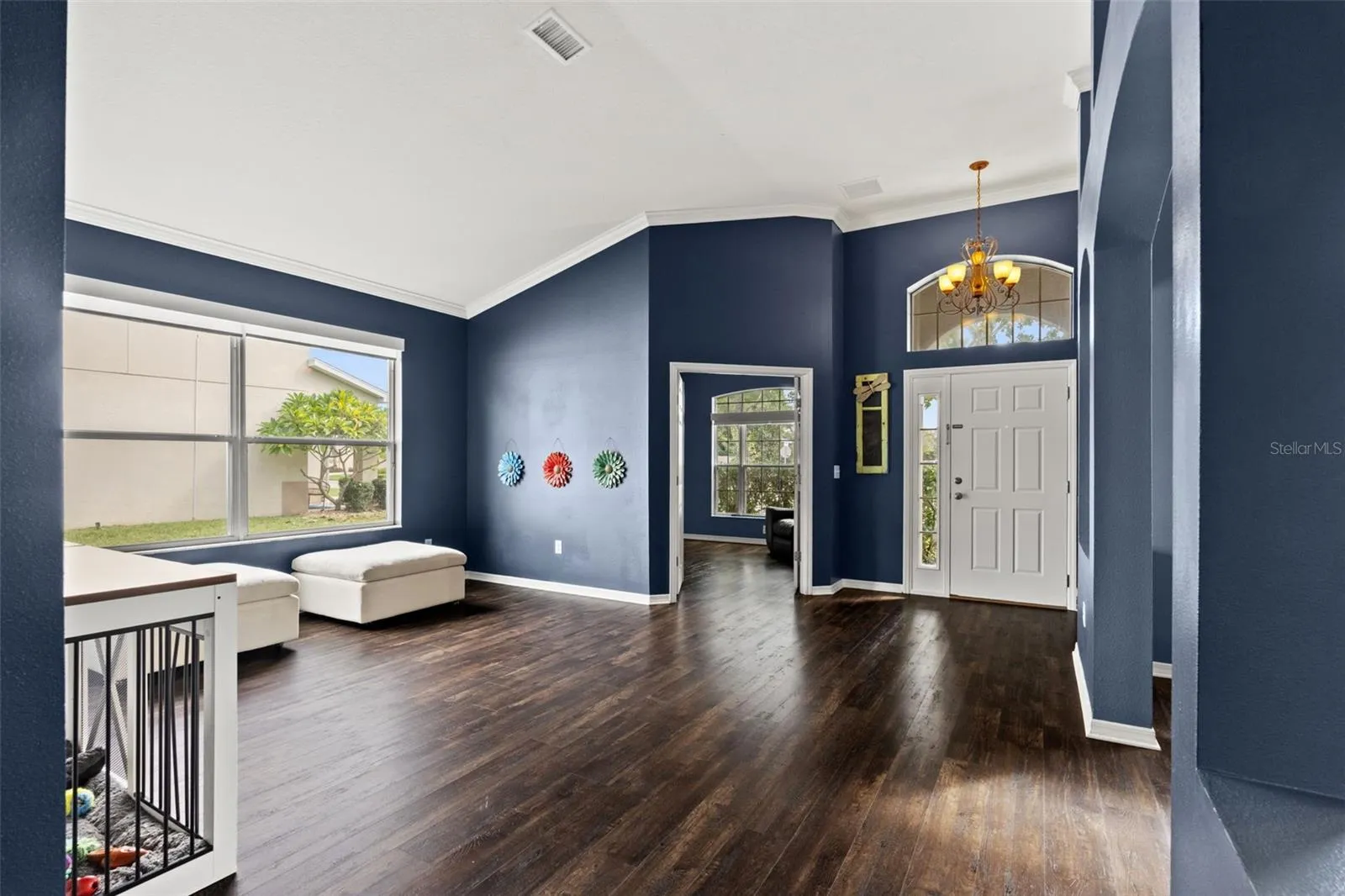 The front living area offers flexible space for entertaining, relaxing, or creating an additional conversation area.