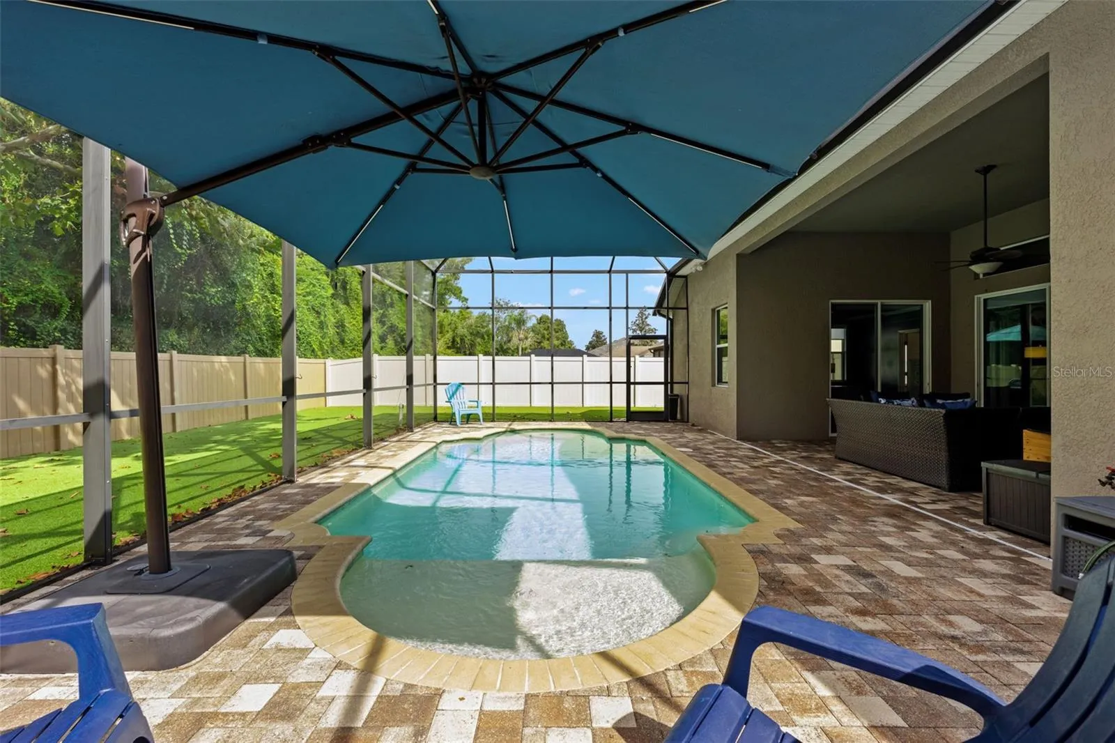 With no rear neighbors, the outdoor living area enjoys an added sense of privacy that’s hard to replicate.