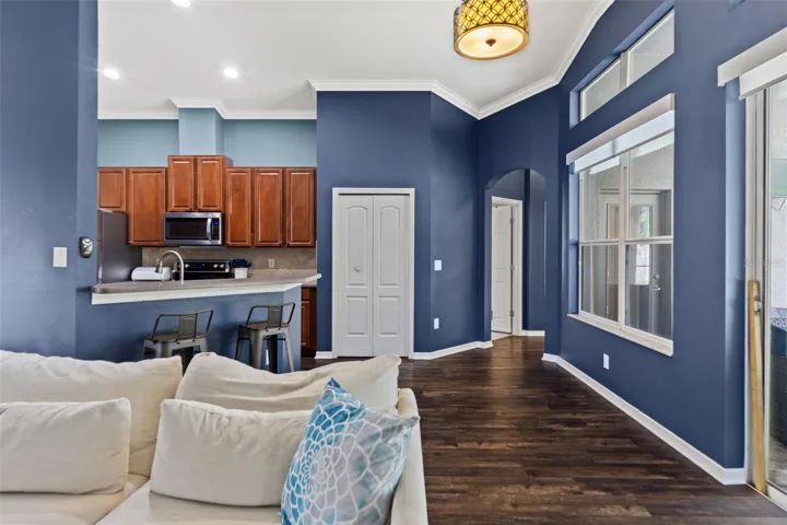 The kitchen and family room connect seamlessly, making it easy to cook, gather, and entertain without anyone feeling tucked away.