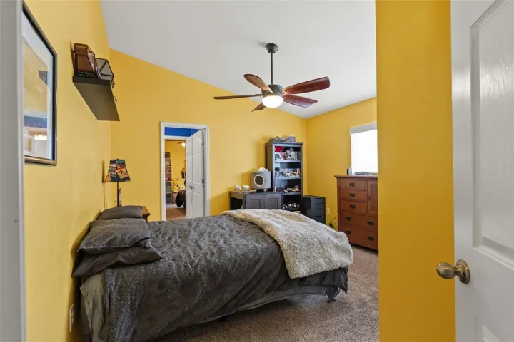 One of four bedrooms, this generously sized room offers flexibility for family, guests, or additional work-from-home space.