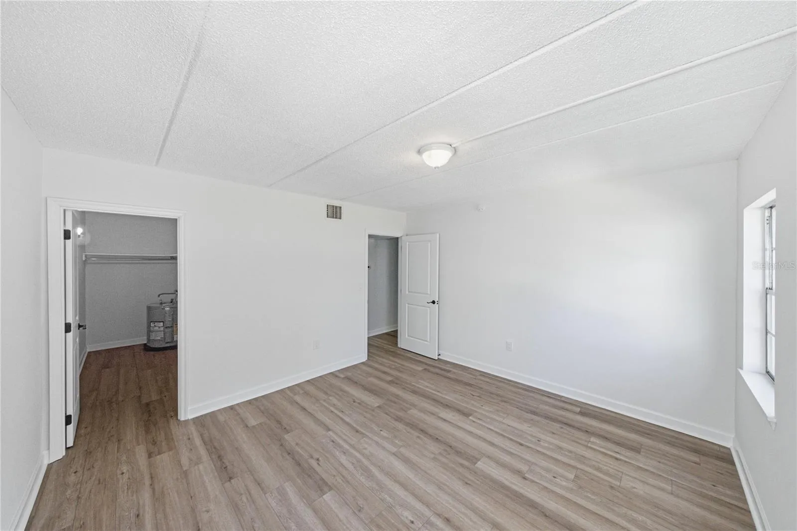 Primary Bedroom & Closet