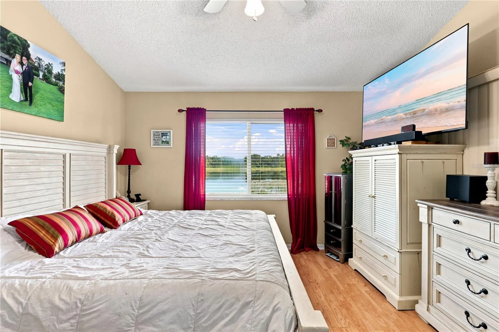 Primary Bedroom with view of lake