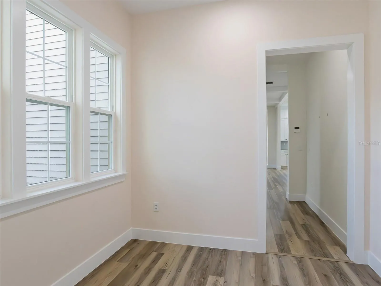 Sitting room outside primary bedroom looking toward 1/2 bath