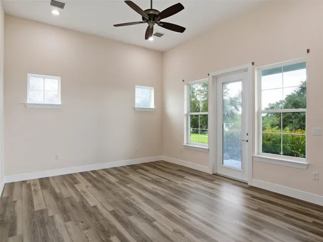 Primary bedroom with door to porch