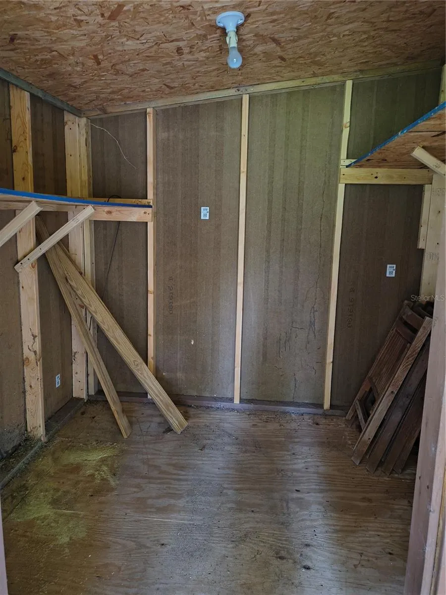 Storage room off covered porch