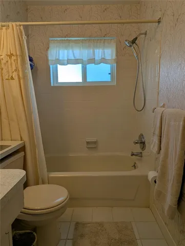 Main bathroom offers choice of bath or shower.