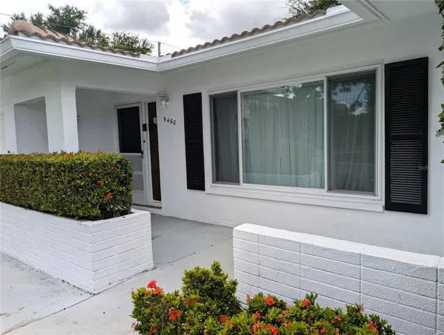 Welcoming front porch is great outdoor space for relaxing.