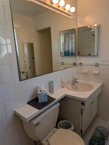 View of vanity area in primary bathroom.