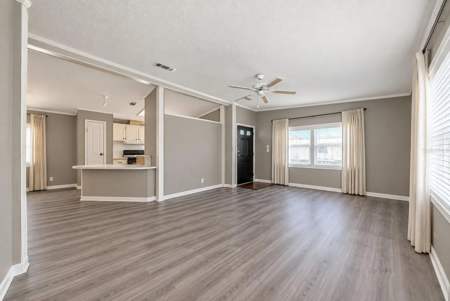 Virtual staged picture to show the potential of this space without furniture