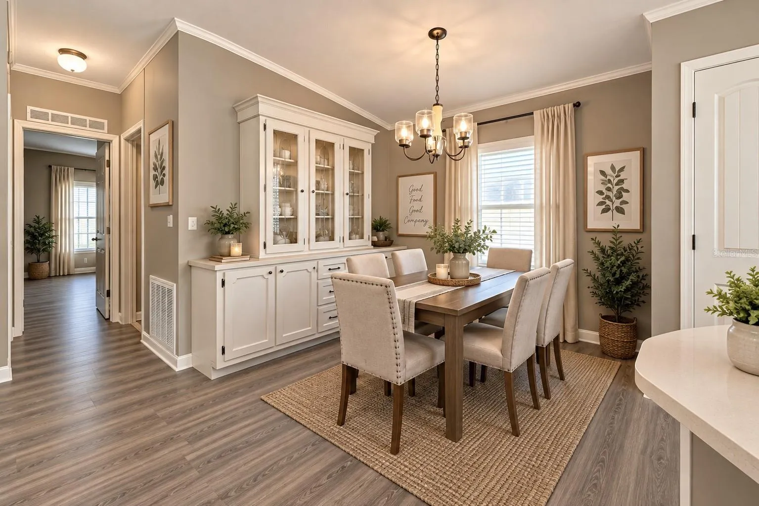 Virtual staged dining room with new flooring and paint