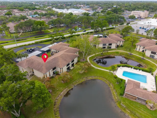 Perfectly located with both pond & pool views~
