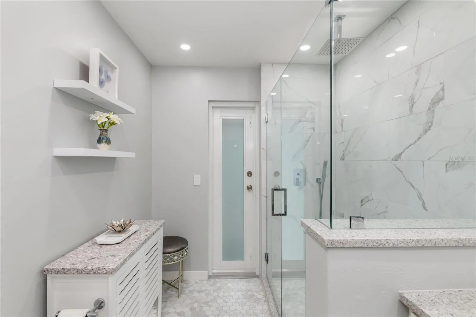 Large Guest Bathroom with easy access from pool and lanai