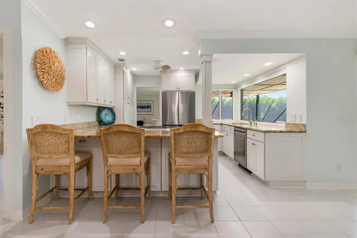 Breakfast bar for easy meals or interacting with the cook.