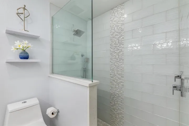 Beautifully tiled and completely updated bathroom.