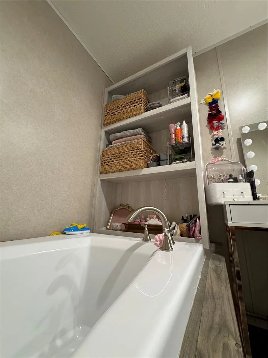 Built in storage at the Master bath tub area
