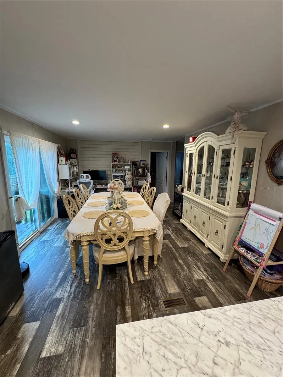 Dining area spacious enough to fit a large table and China cabinet without feeling tight!