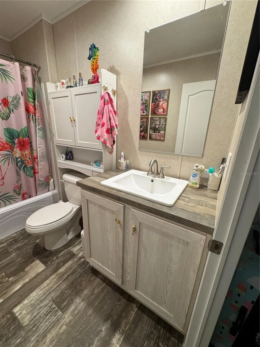 Beautiful vanity and sink area with room to spare