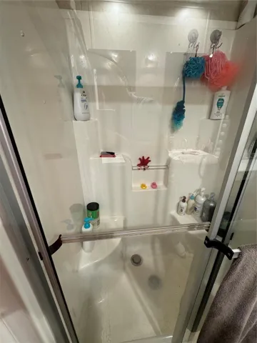 Master shower with double sliding doors
