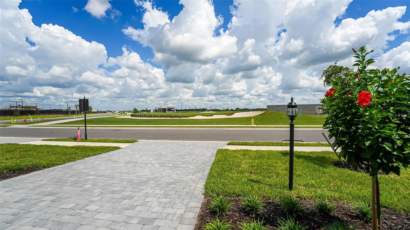 Golf Course Front Yard View. Clubhouse Under Construction on Left Side of Picture