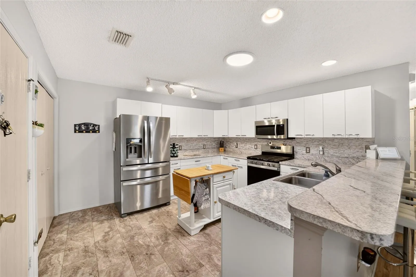 Kitchen with stainless steel appliances