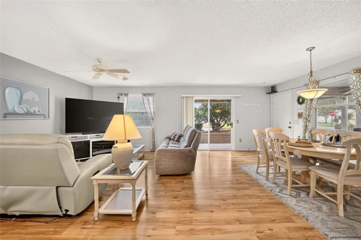 Living and dining area with sliding doors to